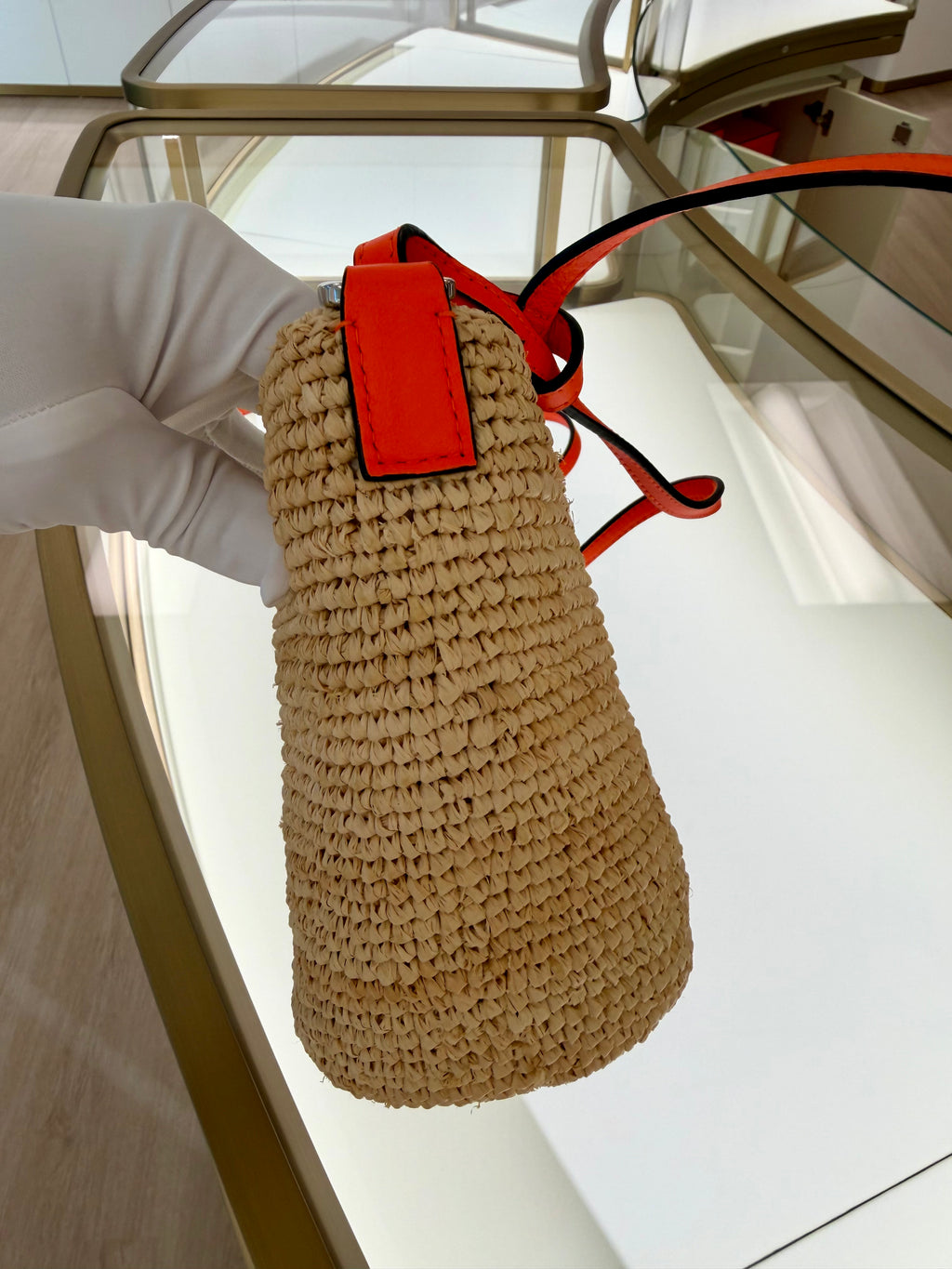 Loewe Slit pochette bag in raffia and calfskin