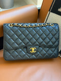 Chanel Classic Flap Bag Maxi Black Caviar
